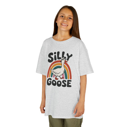 Girl wearing a gray "Silly Goose" rainbow kids T-shirt with a cartoon goose and colorful rainbow. Part of the Vivid Divergence Sensory Friendly Kids Shirts Range. The perfect T-shirt for sensory-sensitive kids and comes with a Sensory Satisfaction Promise.