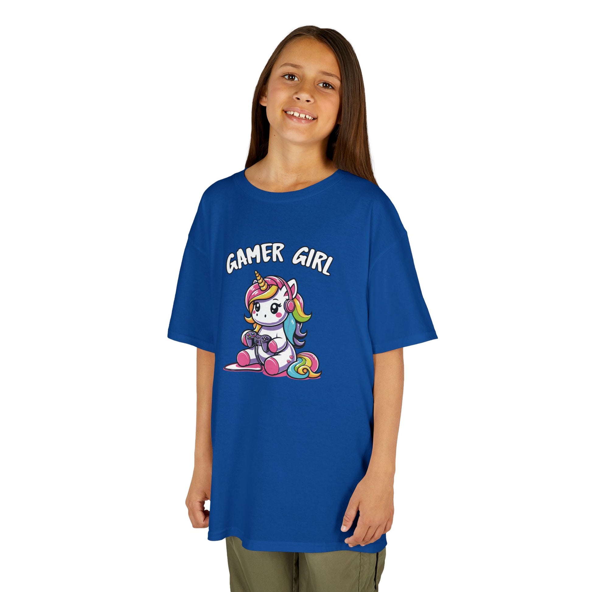 Girl wearing a navy blue "Gamer Girl" unicorn kids T-shirt with a unicorn holding gaming gear. Part of the Vivid Divergence Sensory Friendly Kids Shirts Range. The perfect T-shirt for sensory-sensitive kids and comes with a Sensory Satisfaction Promise.
