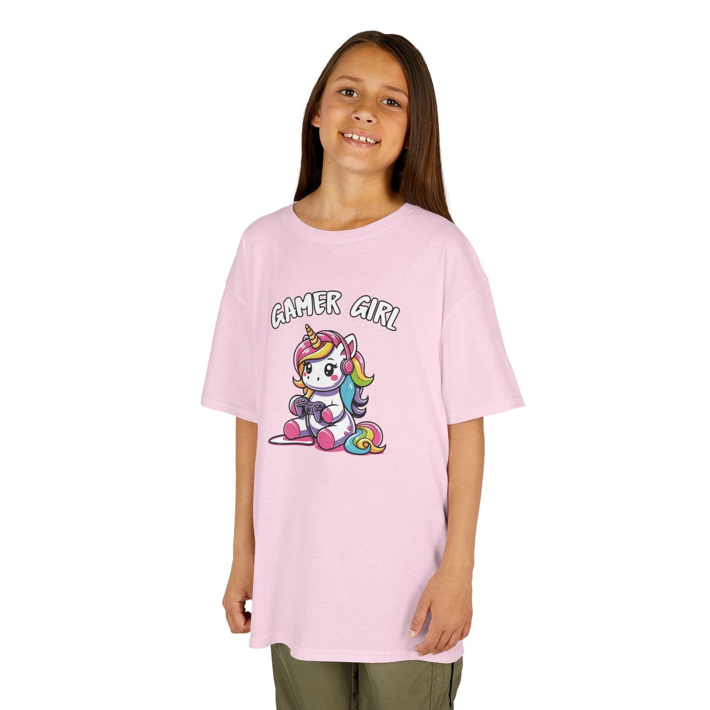 Girl wearing a pink "Gamer Girl" unicorn kids T-shirt with a unicorn holding gaming gear. Part of the Vivid Divergence Sensory Friendly Kids Shirts Range. The perfect T-shirt for sensory-sensitive kids and comes with a Sensory Satisfaction Promise.