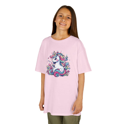 Girl wearing a pink "Unicorn Vibes" kids T-shirt with a colorful, whimsical unicorn design. Part of the Vivid Divergence Sensory Friendly Kids Shirts Range. The perfect T-shirt for sensory-sensitive kids and comes with a Sensory Satisfaction Promise.