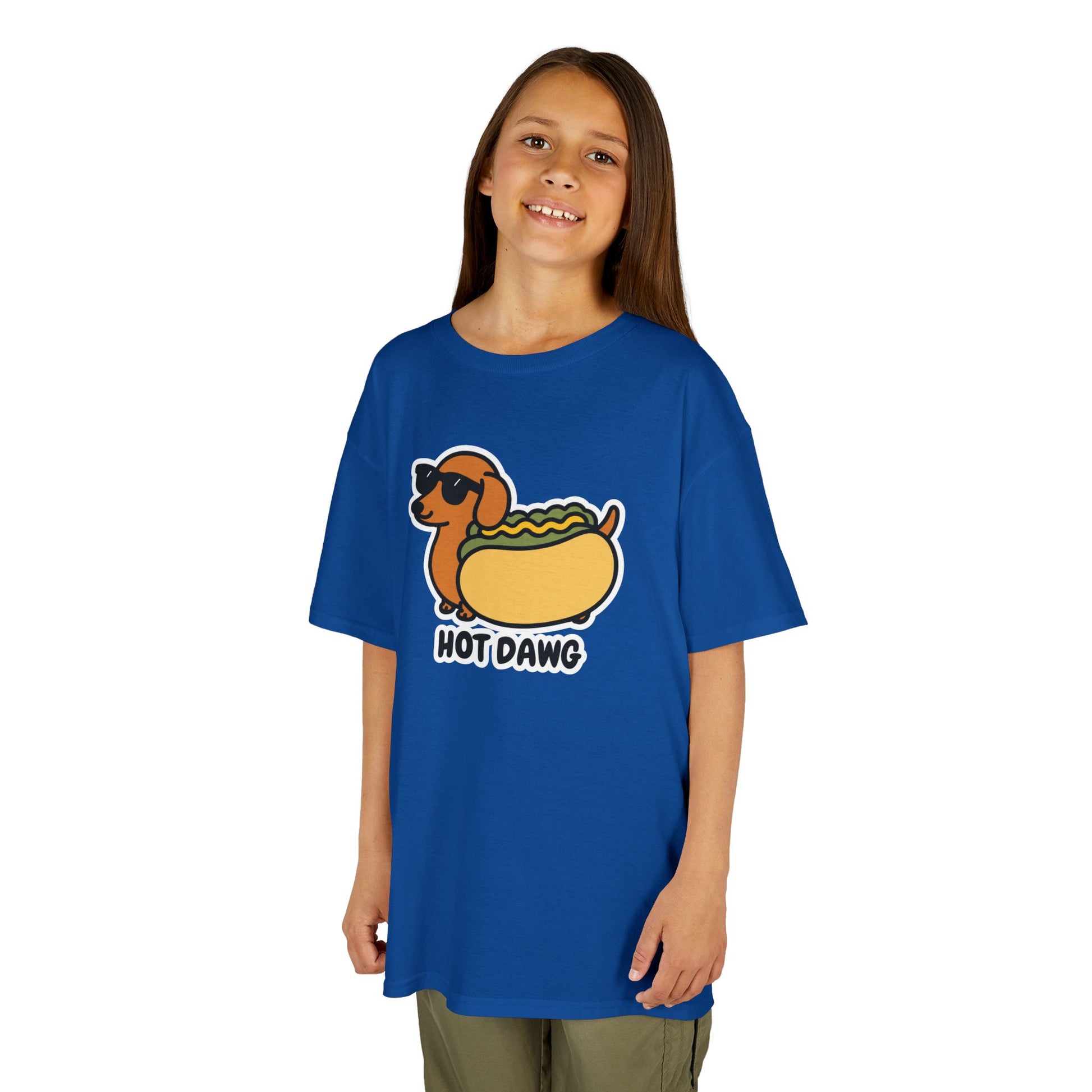 Girl wearing a royal blue "Hot Dawg" kids T-shirt with a cartoon dachshund in a hot dog bun. Part of the Vivid Divergence Sensory Friendly Kids Shirts Range. The perfect T-shirt for sensory-sensitive kids and comes with a Sensory Satisfaction Promise.