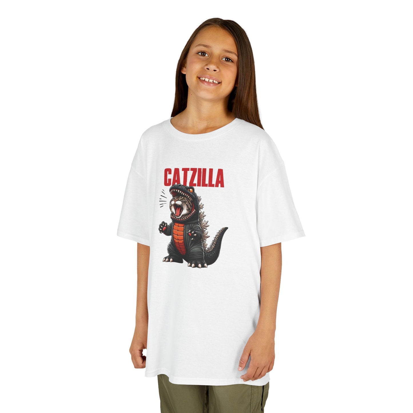 Girl wearing a white "Catzilla" Godzilla parody kids T-shirt with a cartoon cat designed like Godzilla. Part of the Vivid Divergence Sensory Friendly Kids Shirts Range. The perfect T-shirt for sensory-sensitive kids and comes with a Sensory Satisfaction Promise.