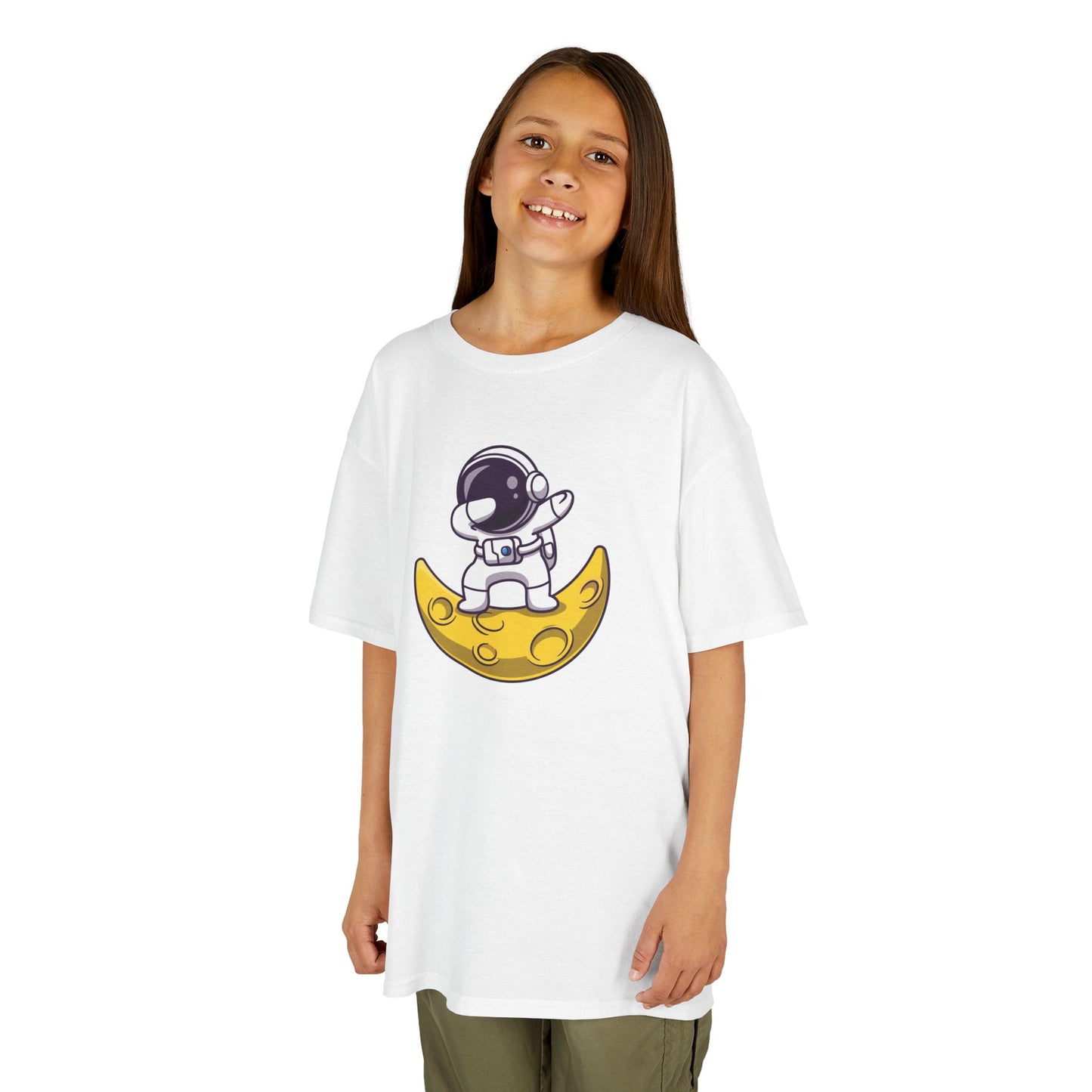Girl wearing a white "Dabbing Astronaut on the Moon" kids T-shirt with an astronaut dabbing while sitting on a crescent moon. Part of the Vivid Divergence Sensory Friendly Kids Shirts Range. The perfect T-shirt for sensory-sensitive kids and comes with a Sensory Satisfaction Promise.