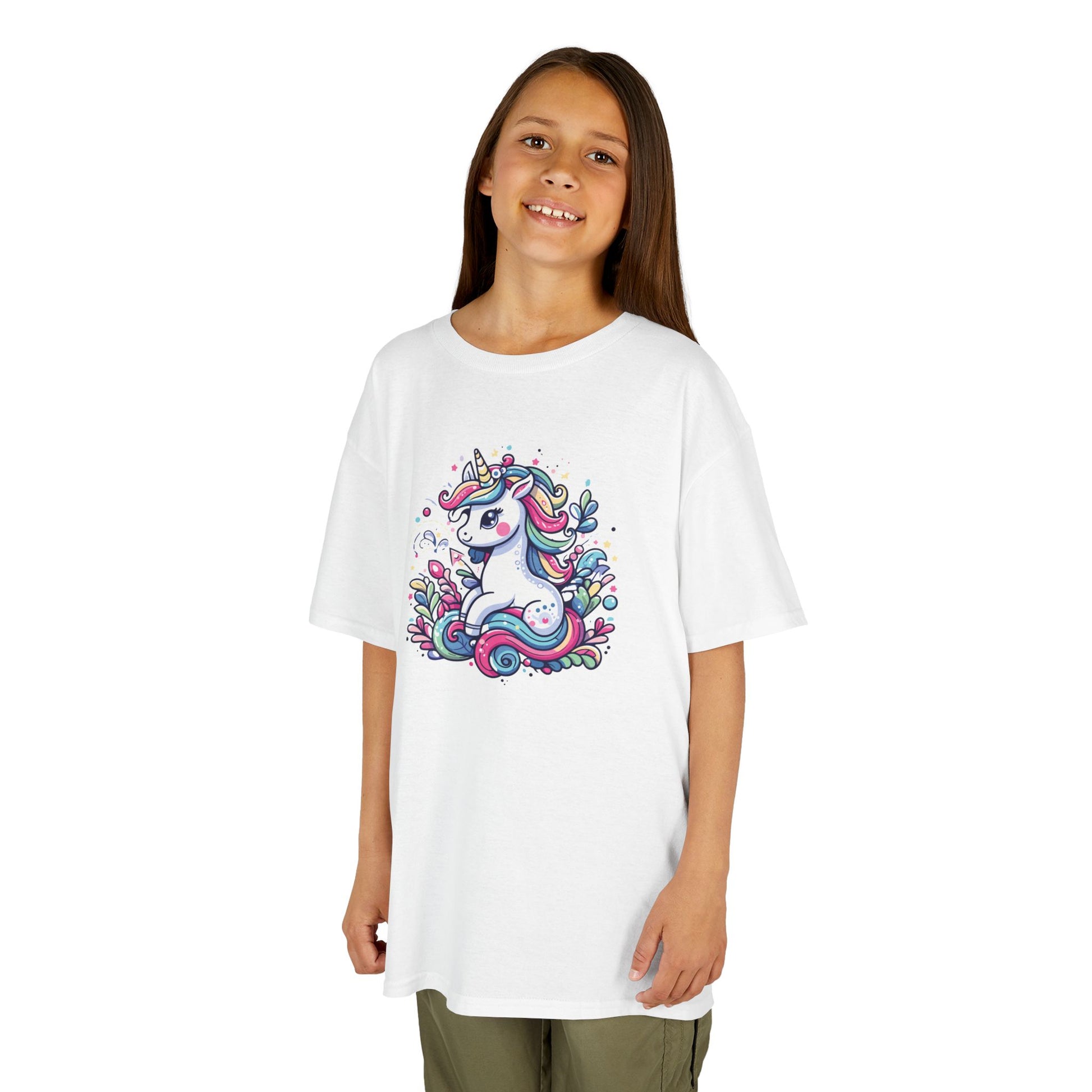 Girl wearing a white "Unicorn Vibes" kids T-shirt with a colorful, whimsical unicorn design. Part of the Vivid Divergence Sensory Friendly Kids Shirts Range. The perfect T-shirt for sensory-sensitive kids and comes with a Sensory Satisfaction Promise.