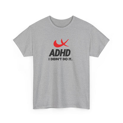 Front view of a gray T-shirt with the phrase "ADHD I Didn't Do It" and a red swoosh parody of the Nike symbol. Part of the Vivid Divergence Sensory Friendly Unisex Tees Range.
