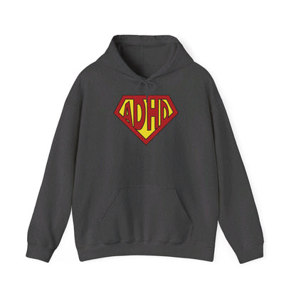 Front view of a gray hoodie featuring the text "ADHD" inside a Superman-style red and yellow shield design. Part of the Vivid Divergence Sensory Friendly Unisex Hoodie Range.