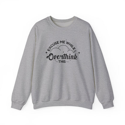 Front view of a gray sweater jumper with the text "Excuse Me While I Overthink This" in black lettering. Part of the Vivid Divergence Sensory Friendly Unisex Sweater Jumper Range.