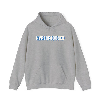 Front view of a gray hoodie featuring the word "HYPERFOCUSED" in a bold, blue Fortnite-style font. Part of the Vivid Divergence Sensory Friendly Unisex Hoodie Range.