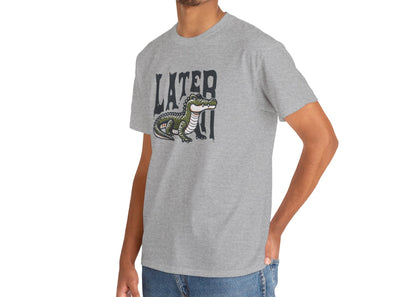 Model wearing a gray T-shirt featuring a "Later Alligator" design with a detailed alligator illustration. Part of the Vivid Divergence Sensory Friendly Unisex Tees Range.