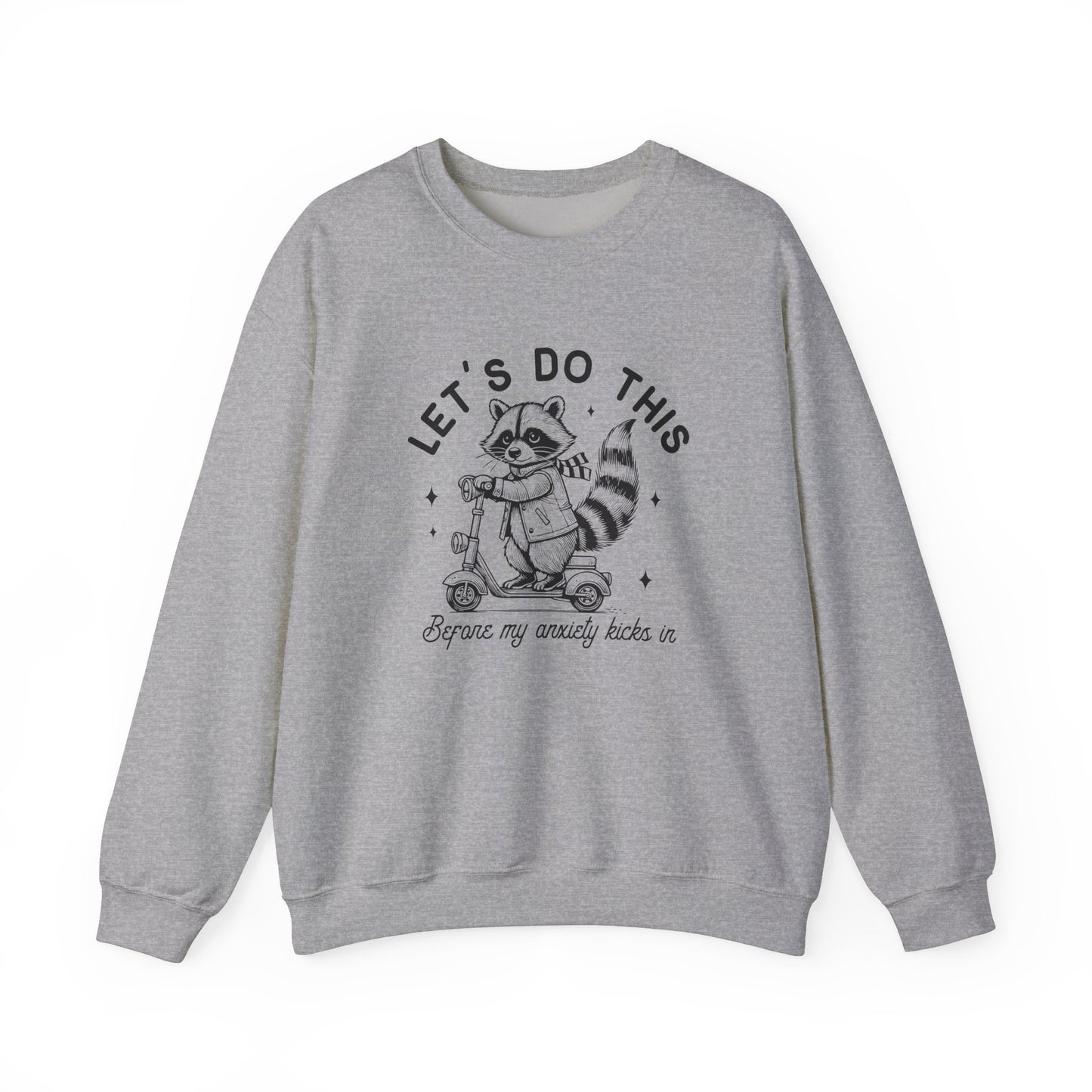 Front view of a gray sweatshirt featuring a cartoon raccoon riding a scooter with the text "Let's Do This Before My Anxiety Kicks In." Part of the Vivid Divergence Sensory Friendly Unisex Sweater Jumper Range.