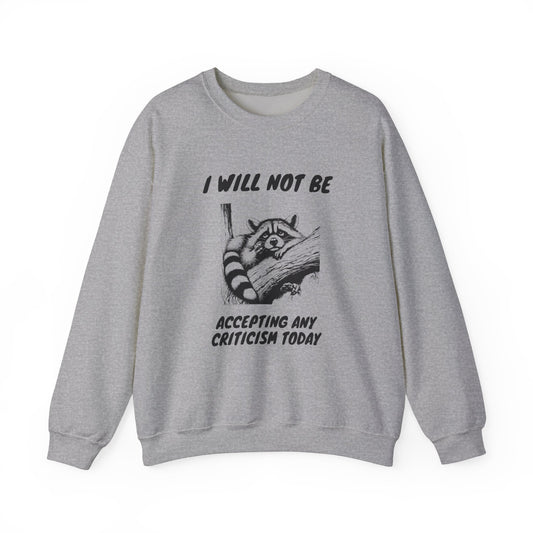 Front view of a gray sweater jumper with the text "I Will Not Be Accepting Any Criticism Today" and a cartoon illustration of a hand with a raised finger. Part of the Vivid Divergence Sensory Friendly Unisex Sweater Jumper Range.