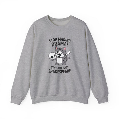 Front view of a gray sweatshirt featuring a cartoon cat holding a skull with the text "Stop Making Drama! You Are Not Shakespeare." Part of the Vivid Divergence Sensory Friendly Unisex Sweater Jumper Range.