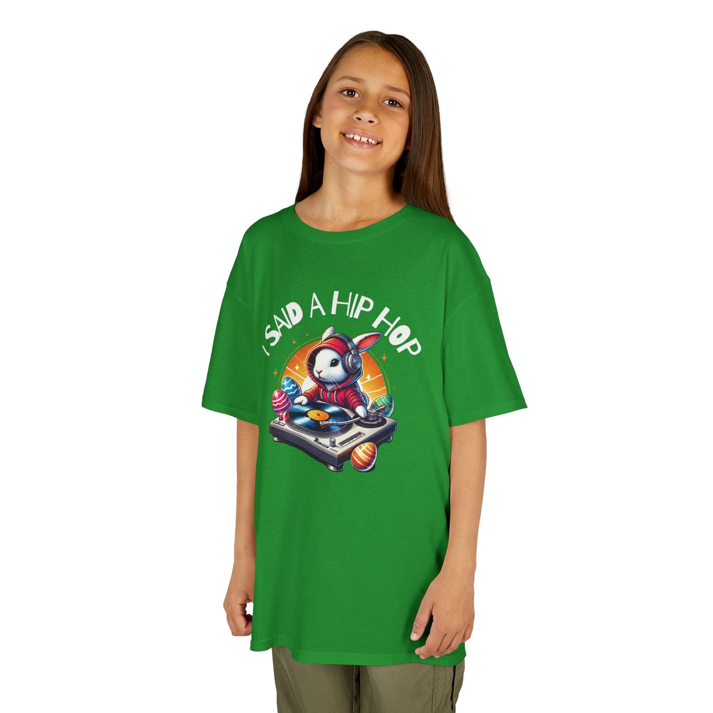Child wearing a green Easter T-shirt featuring a hip-hop bunny and "I Said A Hip Hop" text, bringing classic rap vibes to Easter. Hop into the season in style and shop Easter shirts online today!