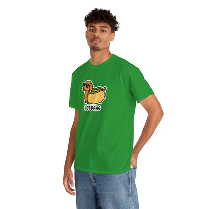 Model wearing a green T-shirt featuring a "Hot Dawg" design with a cartoon dachshund inside a hot dog bun wearing sunglasses. Part of the Vivid Divergence Sensory Friendly Unisex Tees Range.