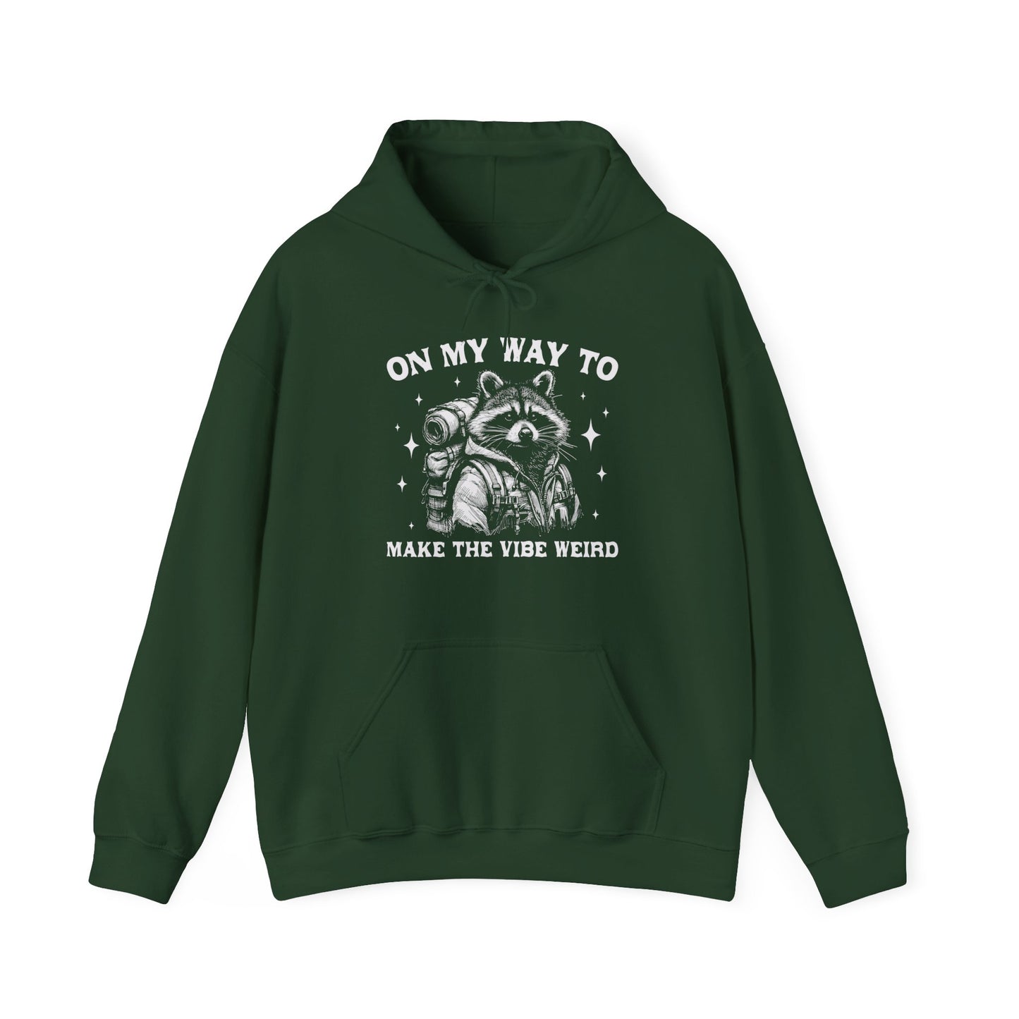 Front view of a green hoodie featuring the text "On My Way to Make the Vibe Weird" and a cartoon illustration of a raccoon holding a stick. Part of the Vivid Divergence Sensory Friendly Unisex Hoodie Range.