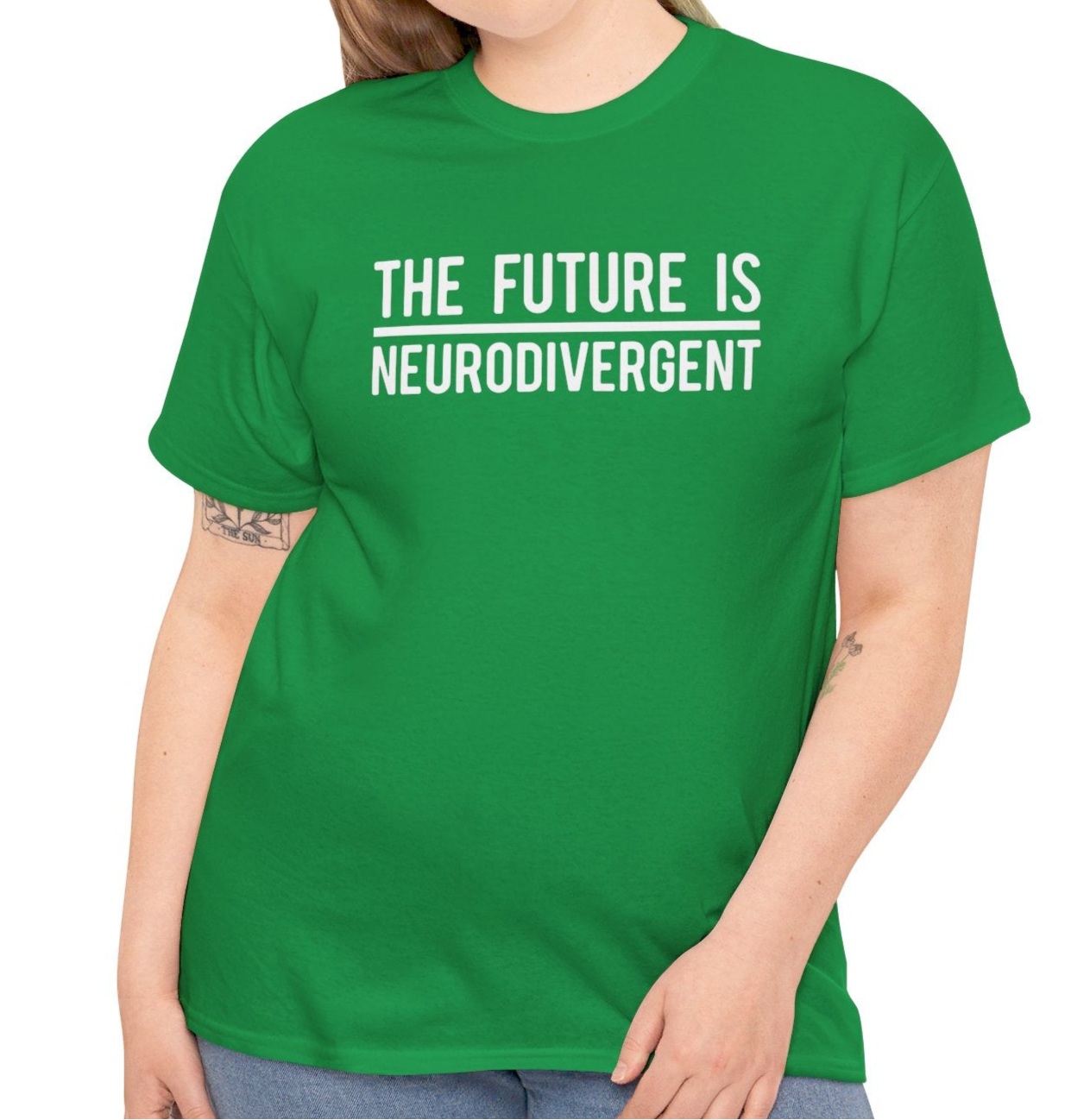 Model wearing a green T-shirt with the text "The Future is Neurodivergent" in bold white letters. Part of the Vivid Divergence Sensory Friendly Unisex Tees Range.