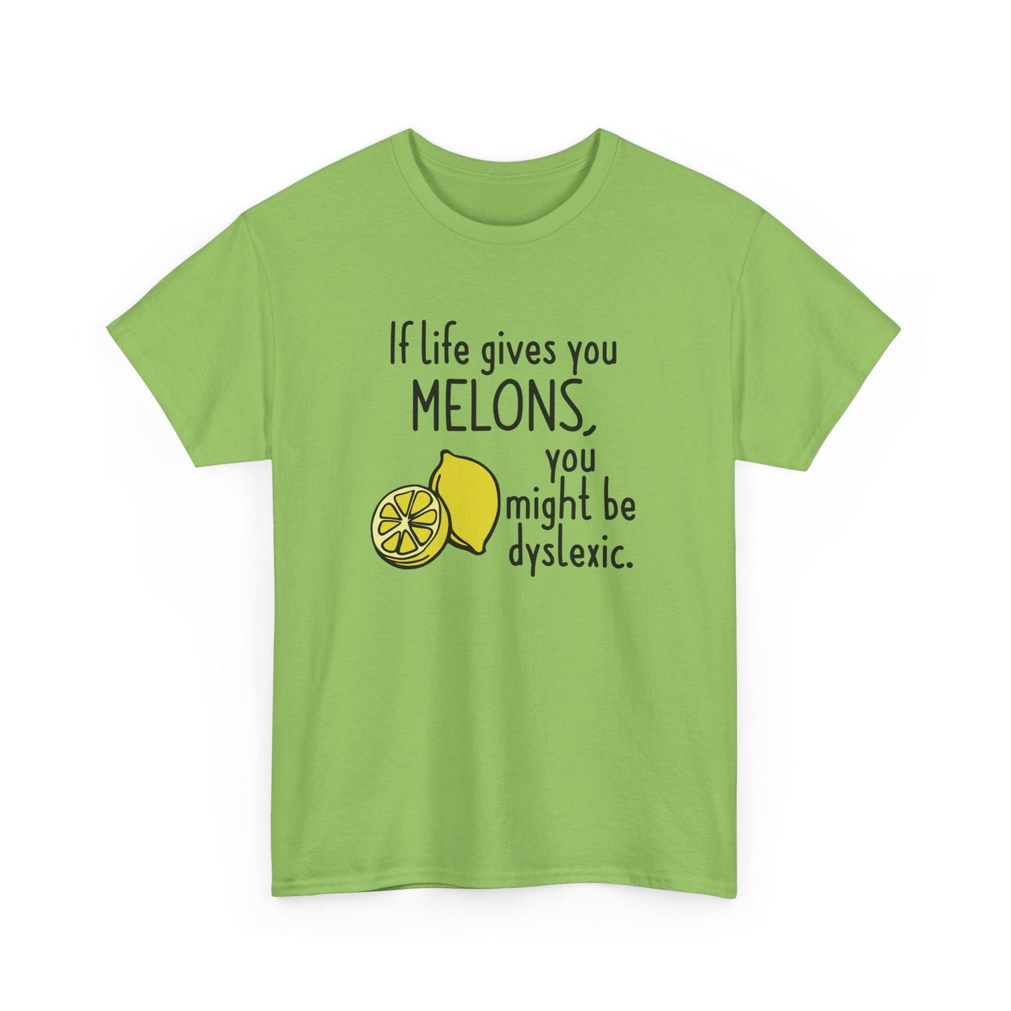 Front view of a green T-shirt featuring a lemon and melon graphic with the text "If life gives you melons, you might be dyslexic." Part of the Vivid Divergence Sensory Friendly Unisex Tees Range.