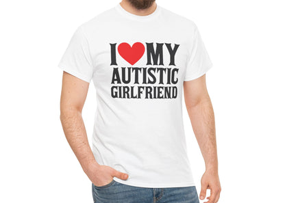 Woman wearing a white "I ❤️ MY AUTISTIC GIRLFRIEND" T-shirt, smiling and posing casually. Part of the Vivid Divergence Sensory Friendly Unisex Tees Range.