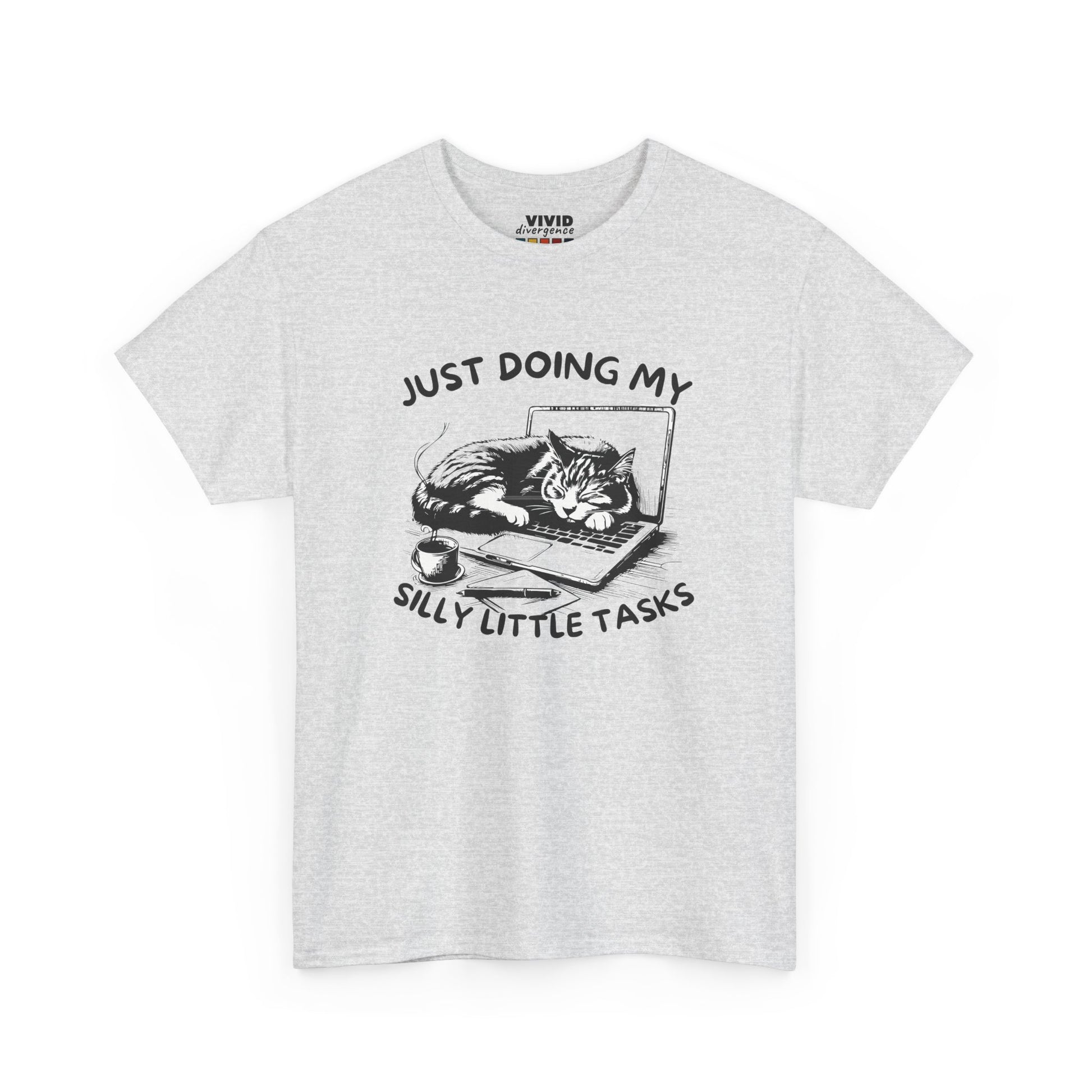 Front view of ash gray T-shirt with cat-on-laptop design and the phrase “Just Doing My Silly Little Tasks.” Mentally curled up in the same position. Part of the Vivid Divergence Memewear Collection!
