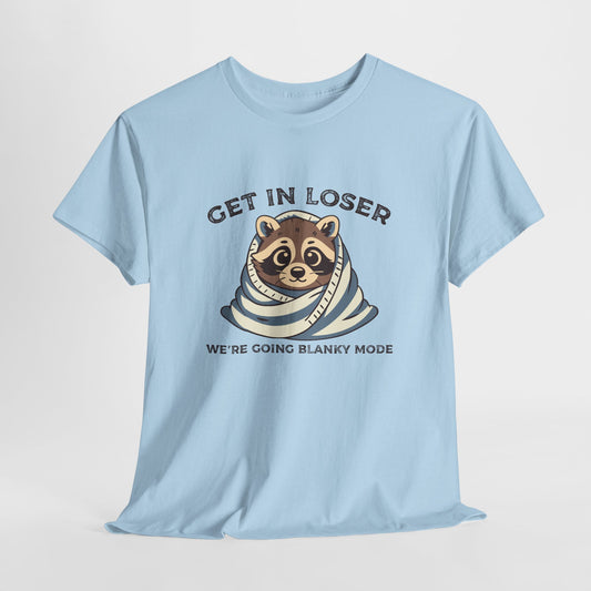 Hanging front view of a light blue T-shirt featuring a cute raccoon wrapped in a blanket with text that reads "Get In Loser, We're Going Blanky Mode." Part of the Vivid Divergence Sensory Friendly Unisex Tees Range.