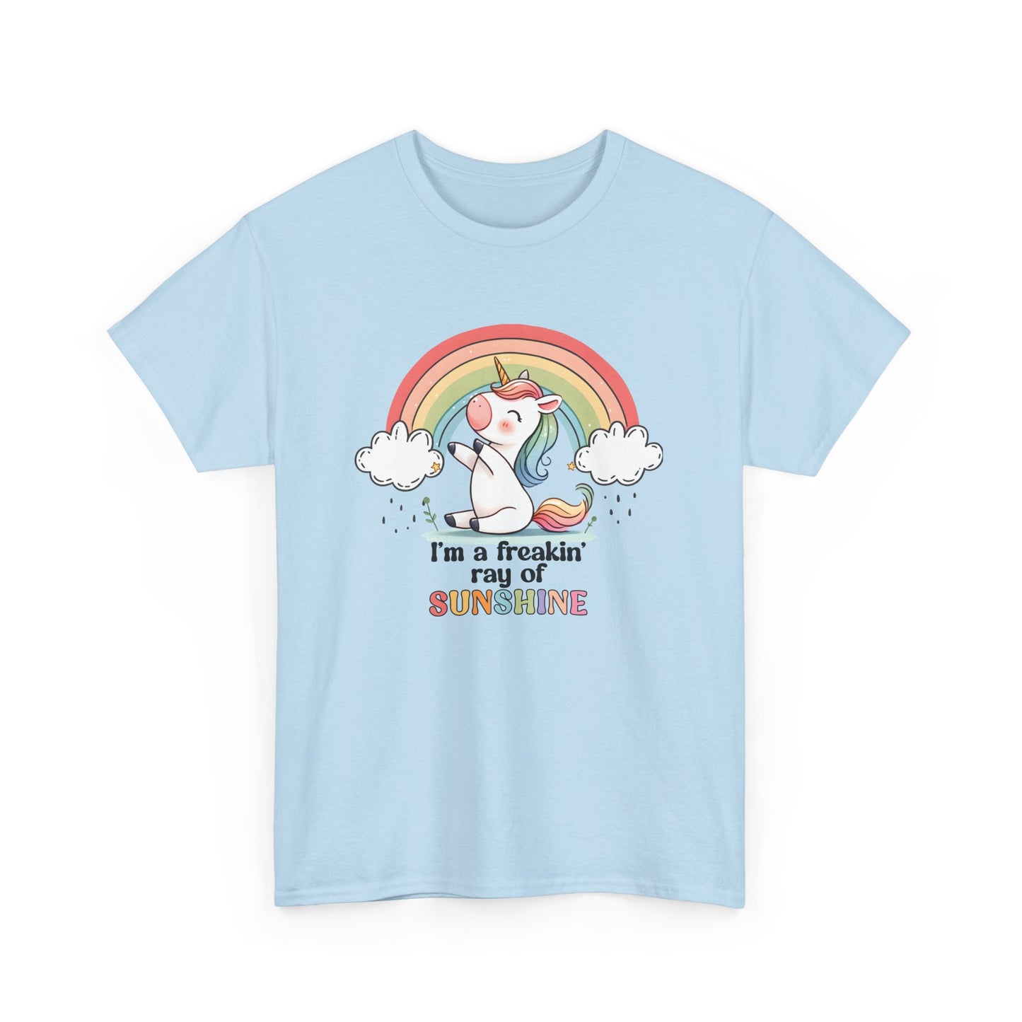 Front view of a light blue T-shirt featuring a rainbow and unicorn graphic with the text "I'm A Freakin Ray Of Sunshine." Part of the Vivid Divergence Sensory Friendly Unisex Tees Range.