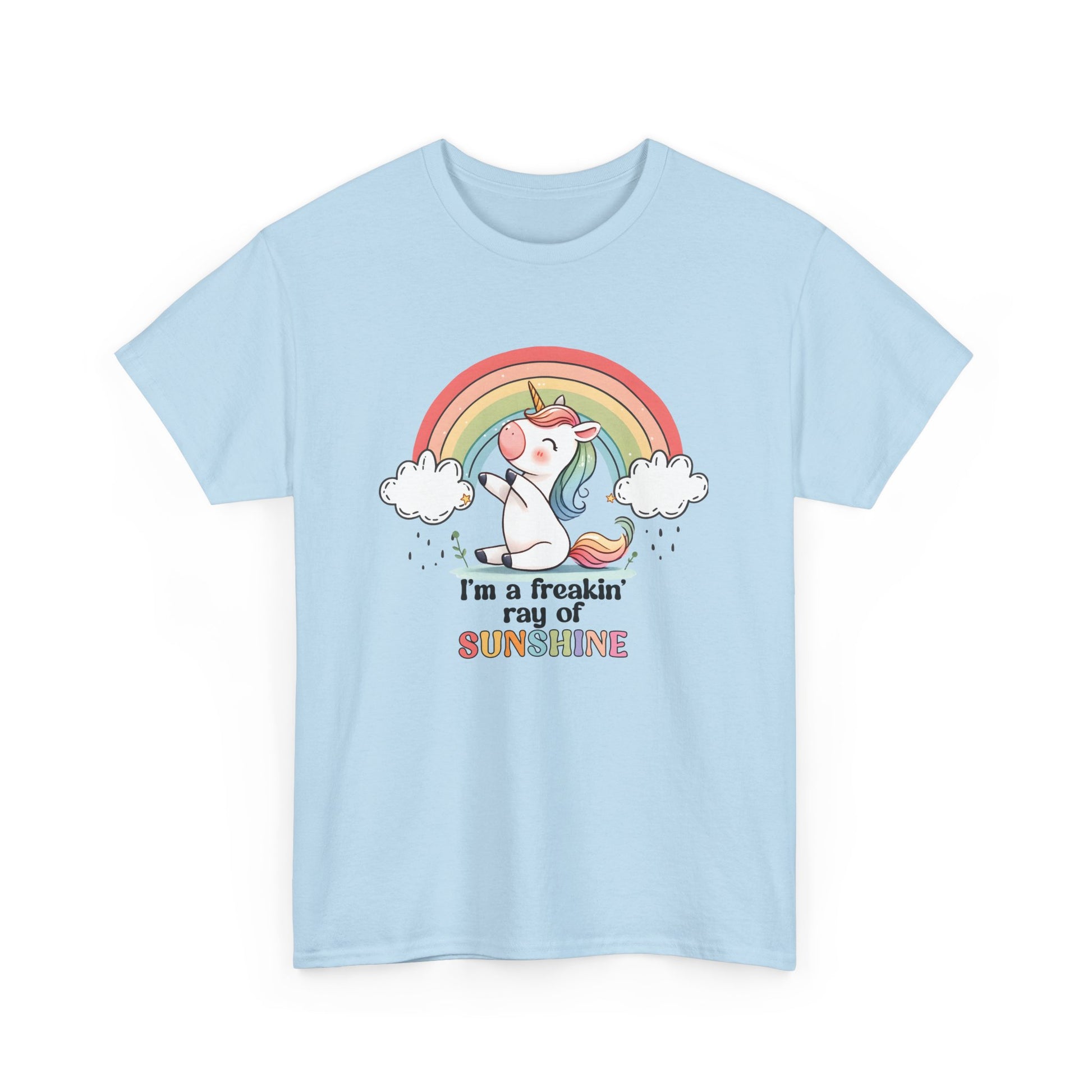Front view of a light blue T-shirt featuring a rainbow and unicorn graphic with the text "I'm A Freakin Ray Of Sunshine." Part of the Vivid Divergence Sensory Friendly Unisex Tees Range.