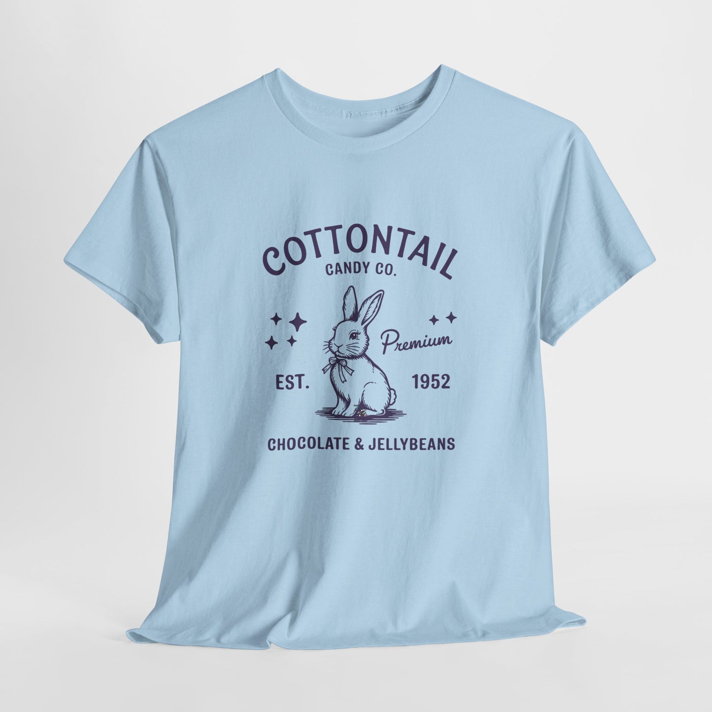 Light Blue T-shirt hanging, showcasing a nostalgic "Cottontail Candy Co." bunny logo, blending timeless charm with Easter tradition. Hop into the season in style and shop Easter shirts online today!