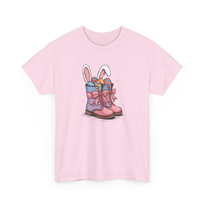 Light Pink Easter T-shirt with cowgirl boots, bunny ears, and colorful eggs, a charming and soft Easter outfit. Hop into the season in style and shop Easter shirts online today!