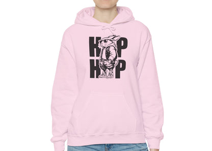 Woman wearing light pink hoodie with cool Easter hip hop bunny graphic. Part of the Vivid Divergence Sensory Friendly Unisex Hoodies Range.