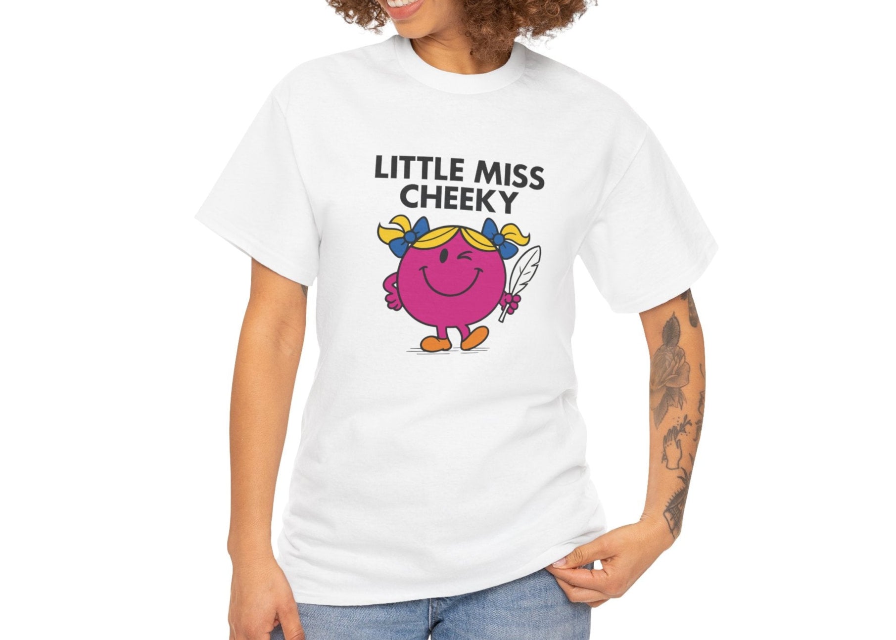 Person wearing the Little Miss Cheeky T-shirt with casual jeans. Part of the Little Miss Meme Character Collection. A Vivid Divergence Sensory Friendly Unisex Tee.