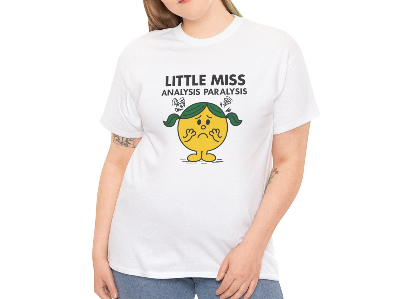 Person wearing the Little Miss Analysis Paralysis T-shirt styled with jeans. Part of the Little Miss Meme Character Collection. A Vivid Divergence Sensory Friendly Unisex Tee.
