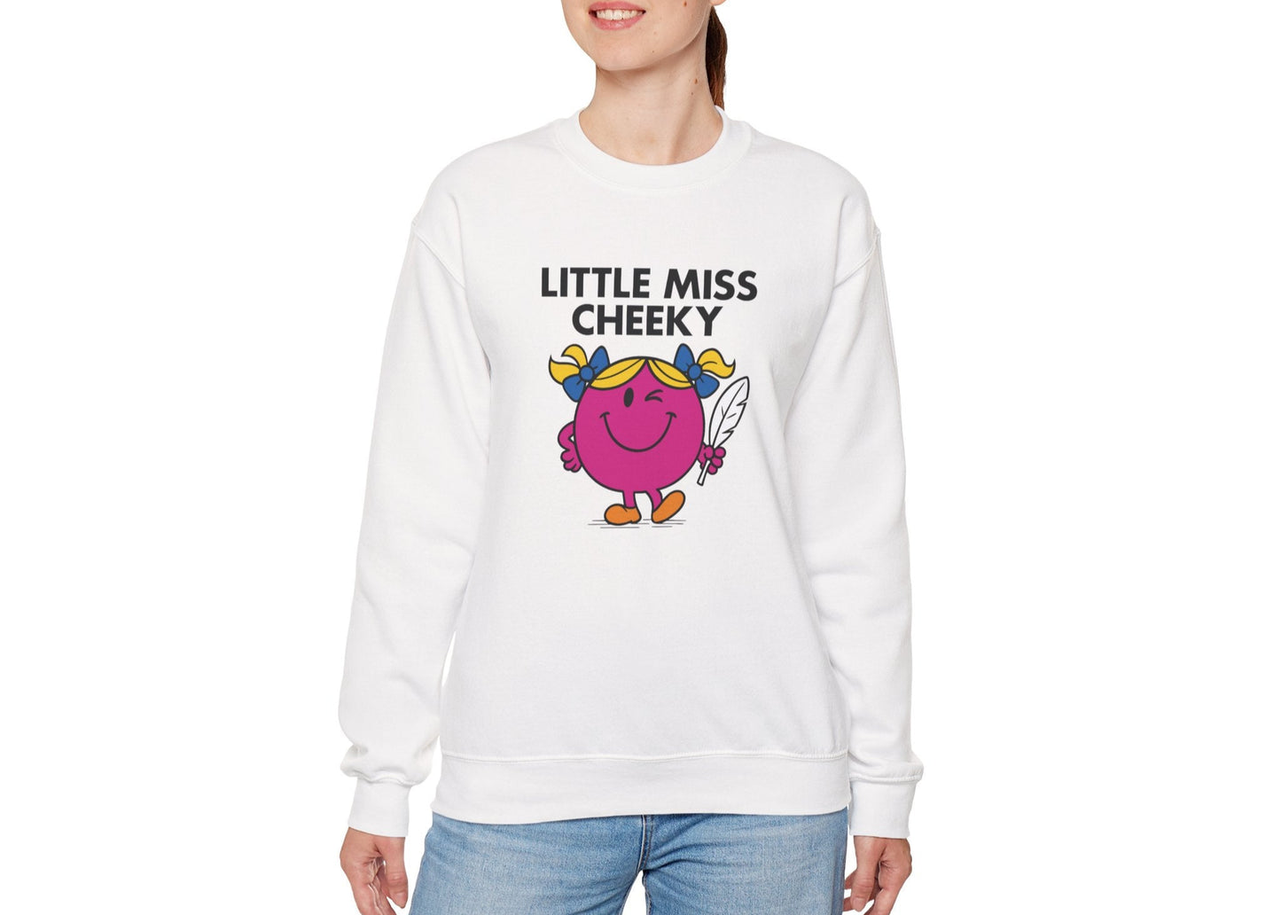 Person wearing the Little Miss Cheeky sweatshirt styled with jeans. Part of the Little Miss Meme Character Collection. A Vivid Divergence Sensory Friendly Sweater Jumper.
