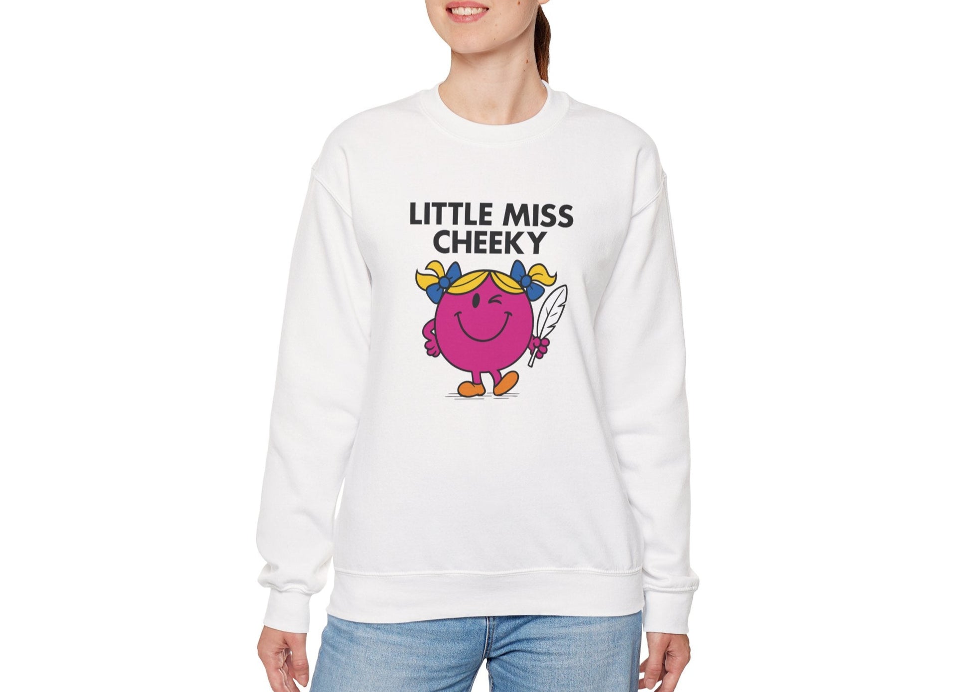 Person wearing the Little Miss Cheeky sweatshirt styled with jeans. Part of the Little Miss Meme Character Collection. A Vivid Divergence Sensory Friendly Sweater Jumper.
