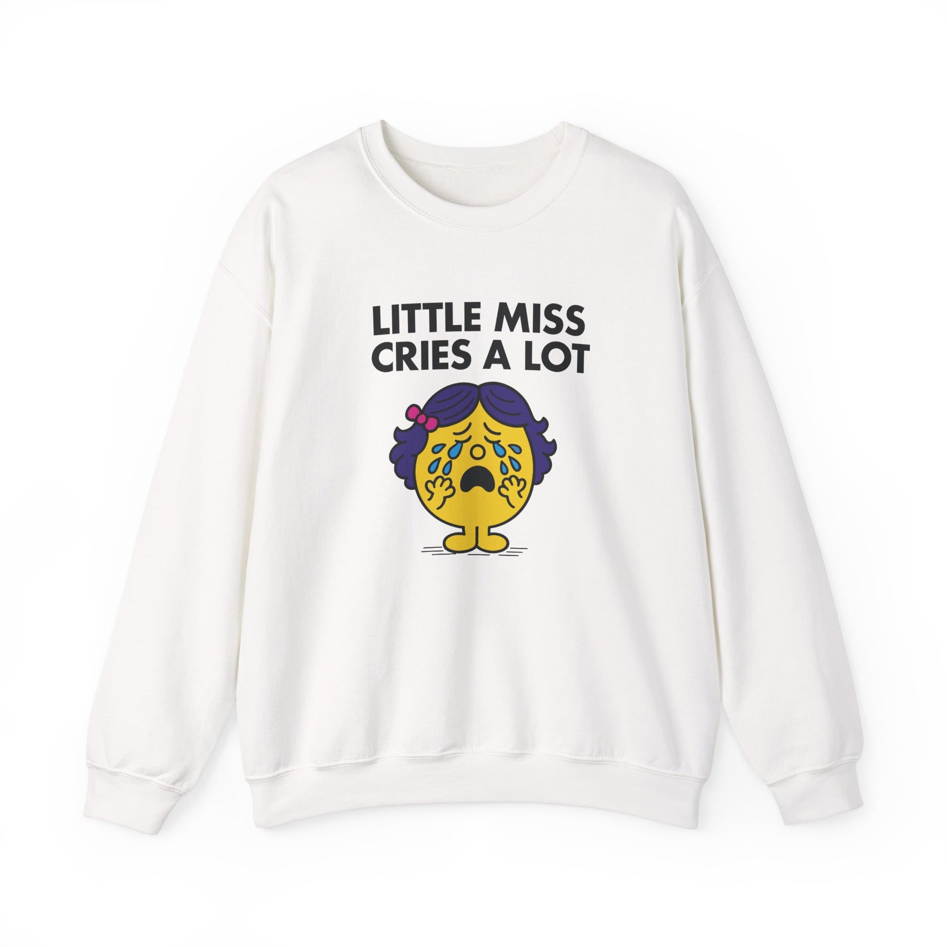 Front view of a white sweatshirt featuring the Little Miss Cries A Lot cartoon graphic. Part of the Little Miss Meme Character Collection. A Vivid Divergence Sensory Friendly Sweater Jumper.
