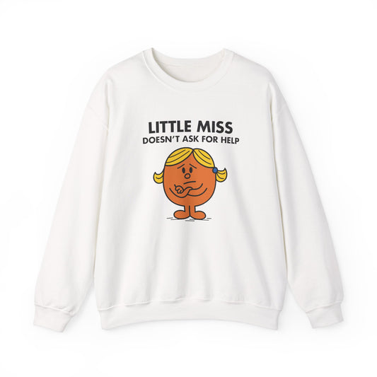 Front view of a white sweatshirt featuring the Little Miss Doesn’t Ask For Help cartoon graphic. Part of the Little Miss Meme Character Collection. A Vivid Divergence Sensory Friendly Sweater Jumper.
