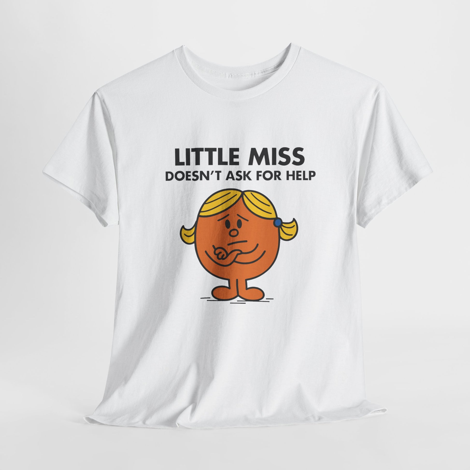 White Little Miss Doesn’t Ask For Help T-shirt laid flat to display the design. Part of the Little Miss Meme Character Collection. A Vivid Divergence Sensory Friendly Unisex Tee.

