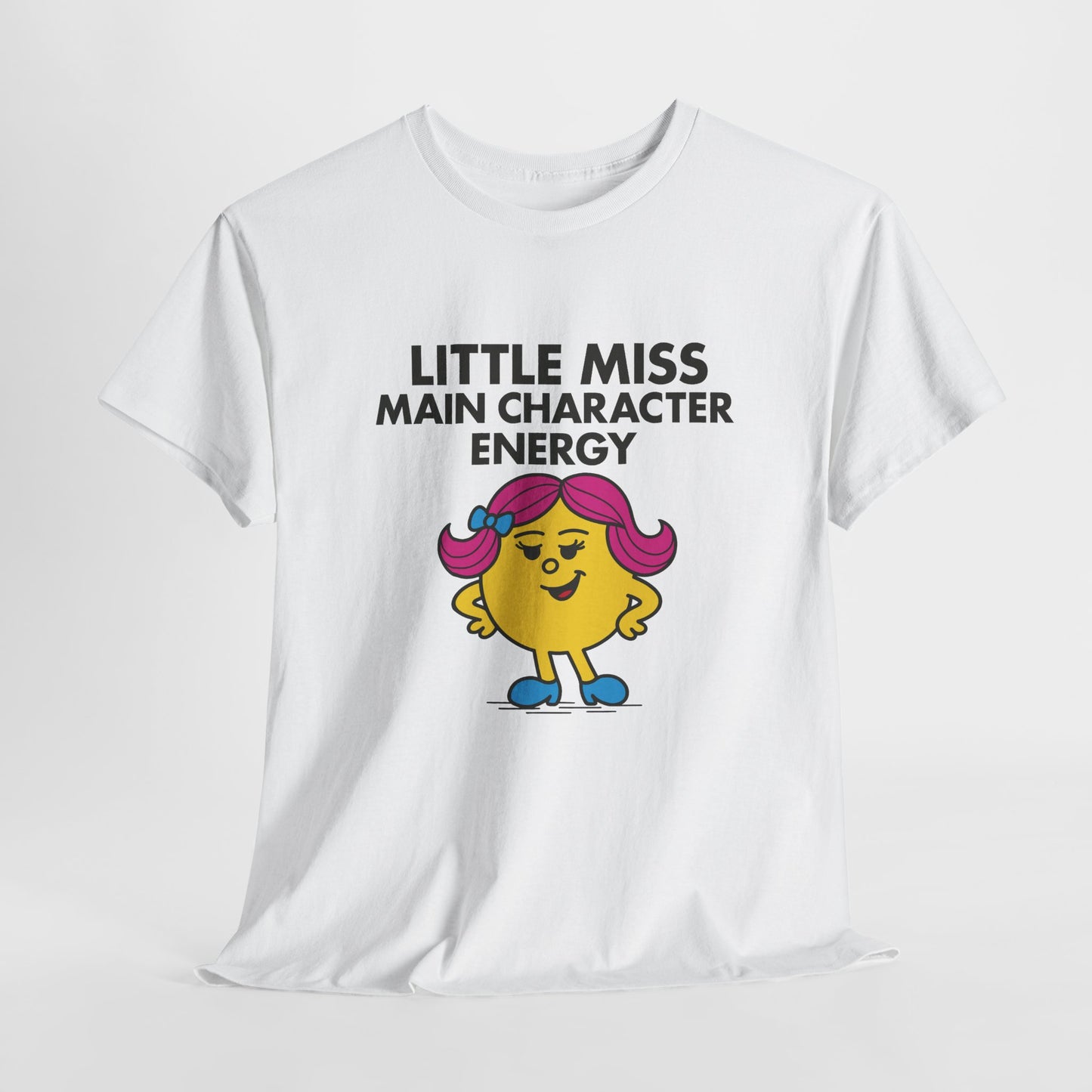 White Little Miss Main Character Energy T-shirt laid flat to display the full design. Part of the Little Miss Meme Character Collection. A Vivid Divergence Sensory Friendly Unisex Tee.
