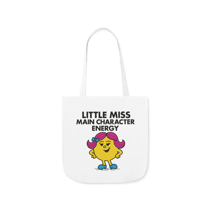 Back view of white canvas tote bag with plain design and sturdy handles. Part of the Vivid Divergence Little Miss Meme Collection!
