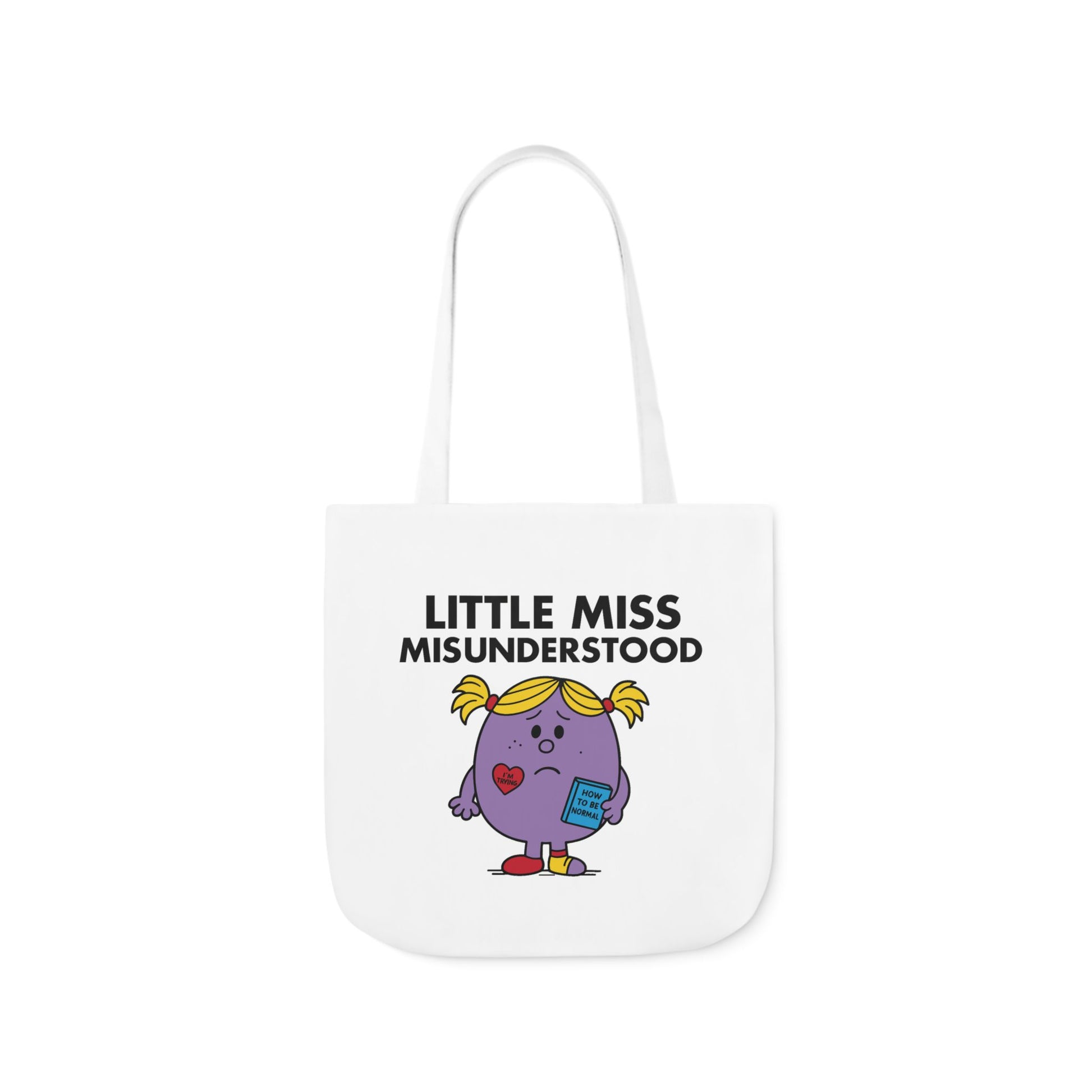Straight-on view of tote bag with Little Miss Misunderstood looking emotional and confused — she meant well, okay? Part of the Vivid Divergence Little Miss Meme Collection!
