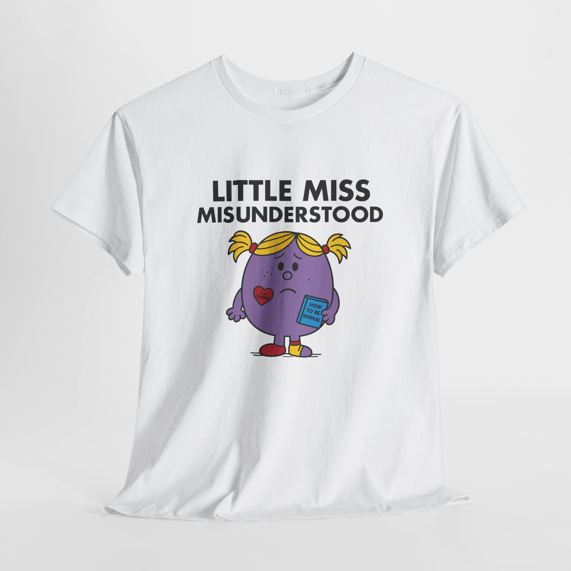 White Little Miss Misunderstood T-shirt laid flat to display the full design. Part of the Little Miss Meme Character Collection. A Vivid Divergence Sensory Friendly Unisex Tee.
