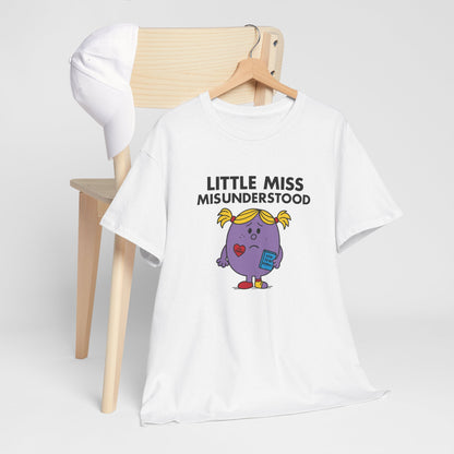 Little Miss Misunderstood T-shirt draped over a chair in a neutral setting. Part of the Little Miss Meme Character Collection. A Vivid Divergence Sensory Friendly Unisex Tee.
