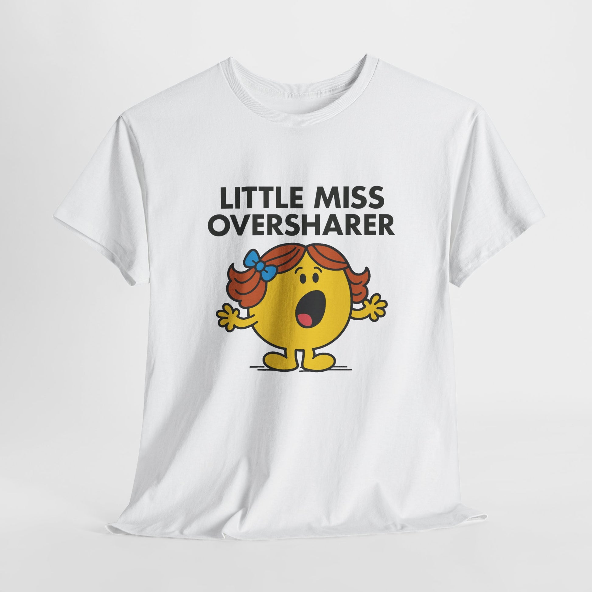 White Little Miss Oversharer T-shirt laid flat to show the full design. Part of the Little Miss Meme Character Collection. A Vivid Divergence Sensory Friendly Unisex Tee.

