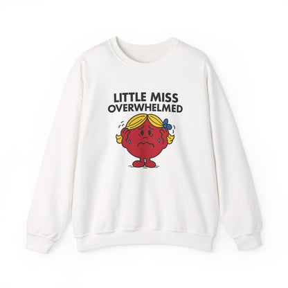 Front view of a white sweatshirt featuring the Little Miss Overwhelmed cartoon graphic. Part of the Little Miss Meme Character Collection. A Vivid Divergence Sensory Friendly Sweater Jumper.
