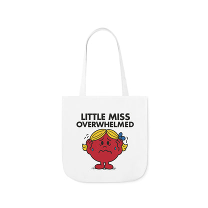Straight-on view of tote bag showing Little Miss Overwhelmed in full panic mode — she's hanging on by a spreadsheet and a prayer. Part of the Vivid Divergence Little Miss Meme Collection!
