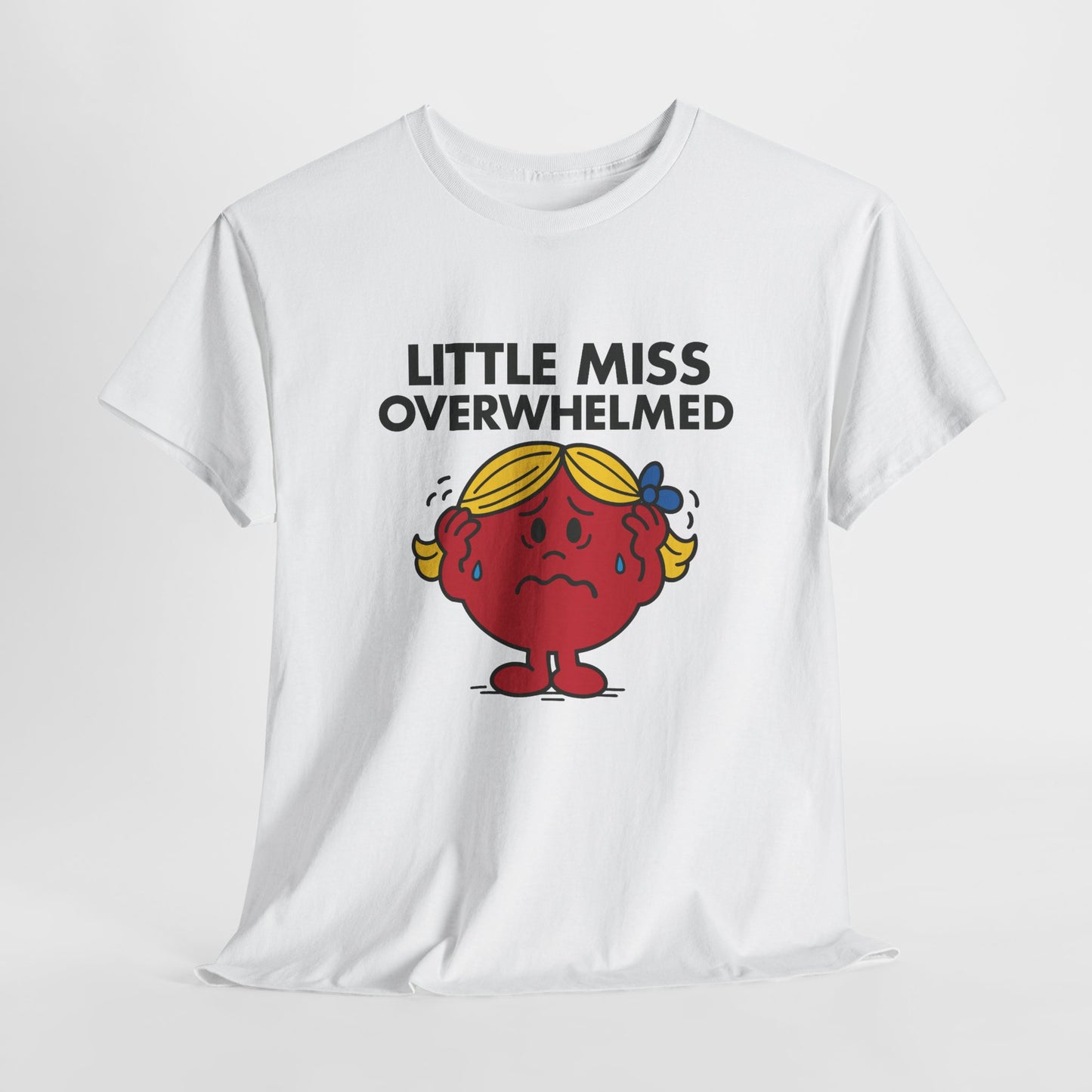 White Little Miss Overwhelmed T-shirt laid flat to display the full design. Part of the Little Miss Meme Character Collection. A Vivid Divergence Sensory Friendly Unisex Tee.

