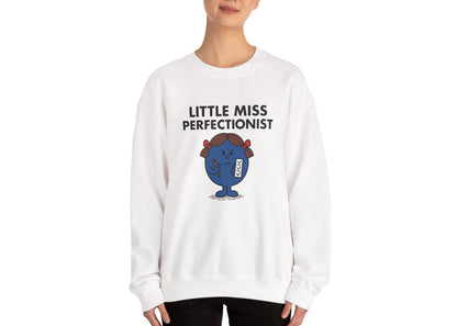 Person wearing the Little Miss Perfectionist sweatshirt in a front-facing pose. Part of the Little Miss Meme Character Collection. A Vivid Divergence Sensory Friendly Sweater Jumper.
