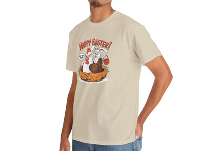 Man wearing a sand Easter T-shirt showcasing a funny hen and bunny mix-up, a perfect choice for Easter gatherings and egg hunts. Hop into the season in style and shop Easter shirts online today!
