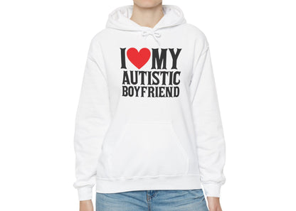 Model wearing a white hoodie with bold black text that reads "I ❤️ My Autistic Boyfriend," standing with hands at sides. Part of the Vivid Divergence Sensory Friendly Unisex Hoodie Range.