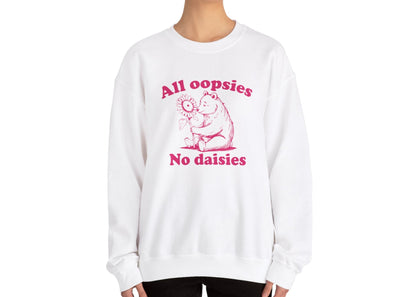 Model wearing a white sweatshirt with a cartoon bear holding a sunflower and the text "All Oopsies, No Daisies," standing with hands at sides. Part of the Vivid Divergence Sensory Friendly Unisex Sweater Jumper Range.