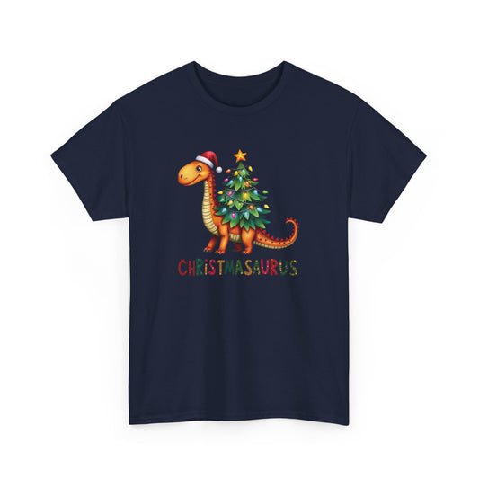 Front view of a navy blue T-shirt featuring a festive illustration of a dinosaur decorated as a Christmas tree with ornaments and lights, and the text "Christmasaurus." Part of the Vivid Divergence Sensory Friendly Unisex Tees Range.